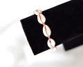 Bransoletka z naturalnymi muszelkami kaur na sznurku Baltoro Design